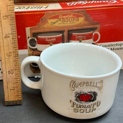 LOT:140: Lot of Campbellâ€™s Soup 4 Mugs with shelf and figure.