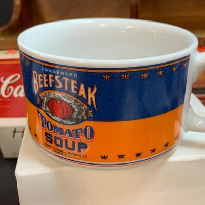 LOT:140: Lot of Campbellâ€™s Soup 4 Mugs with shelf and figure.