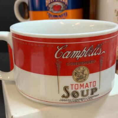LOT:140: Lot of Campbellâ€™s Soup 4 Mugs with shelf and figure.