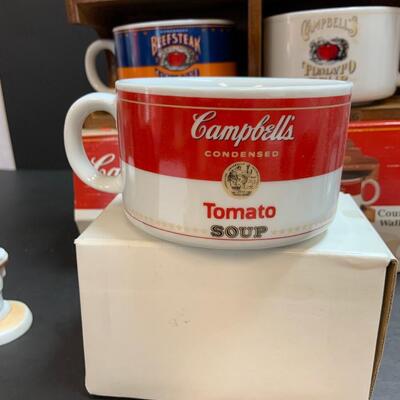 LOT:140: Lot of Campbellâ€™s Soup 4 Mugs with shelf and figure.