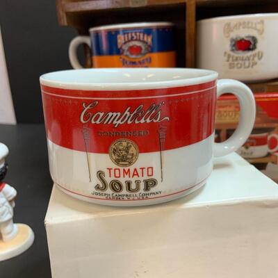 LOT:140: Lot of Campbellâ€™s Soup 4 Mugs with shelf and figure.