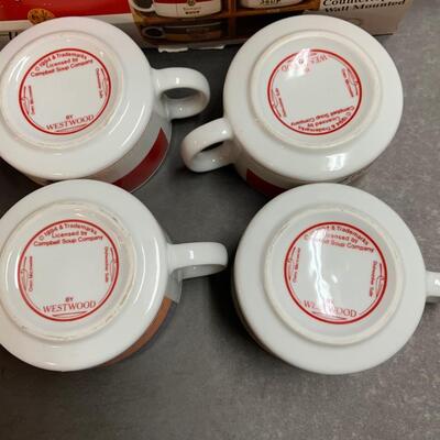 LOT:140: Lot of Campbellâ€™s Soup 4 Mugs with shelf and figure.