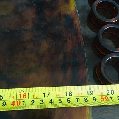 Tortoise plastic placemats and napkin rings