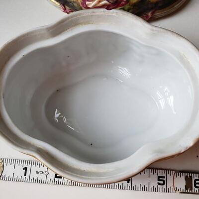 Small Capodimonte bowl with Lid, carvings of figures and babies