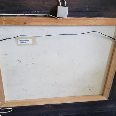 Painting, ornate frame with attached light
