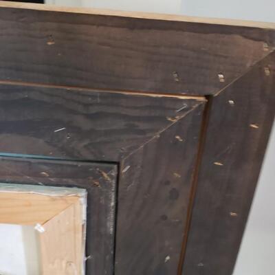 Painting, ornate frame with attached light