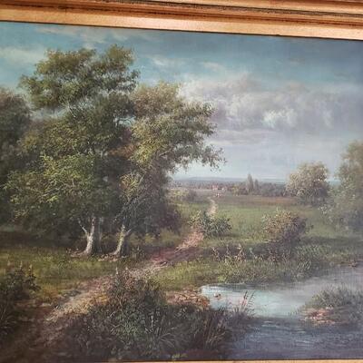 Painting, ornate frame with attached light