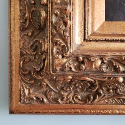 Painting, ornate frame with attached light