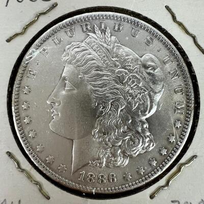629  1886 AU Morgan Silver Dollar