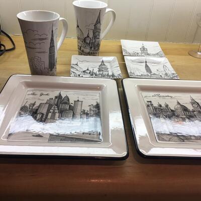 Ceramic plates and tall mugs