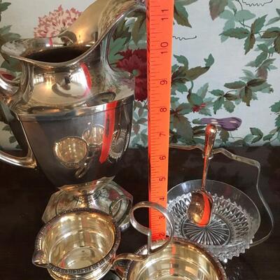 Silver plate collection with bowls on caddy Lot #1