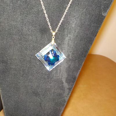 Sterling silver blue crystal necklace .