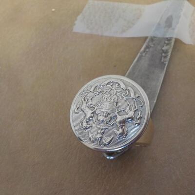 10 K gold base and sterling silver design top ring.