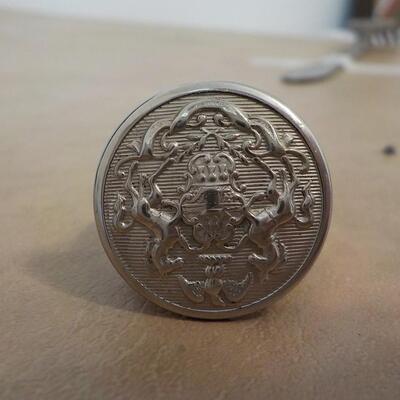 10 K gold base and sterling silver design top ring.