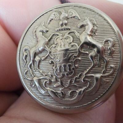 10 K gold base and sterling silver design top ring.