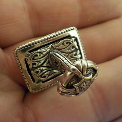 Men's Sterling "Dude" cuff links artistic design.