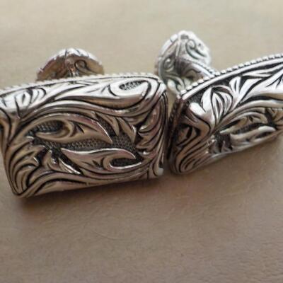 Men's Sterling "Dude" cuff links artistic design.
