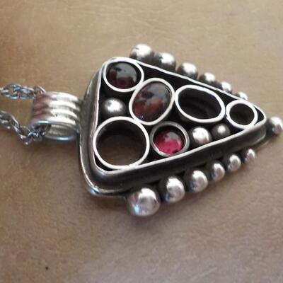 Totally Art Deco sterling silver necklace with precious stones.