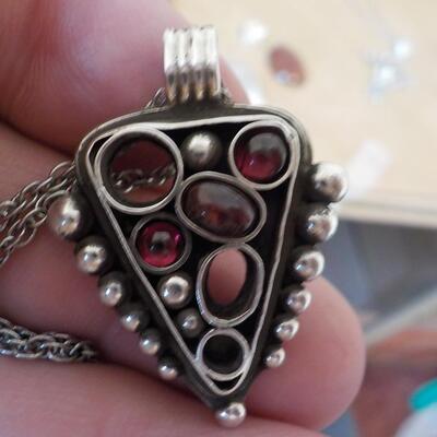 Totally Art Deco sterling silver necklace with precious stones.