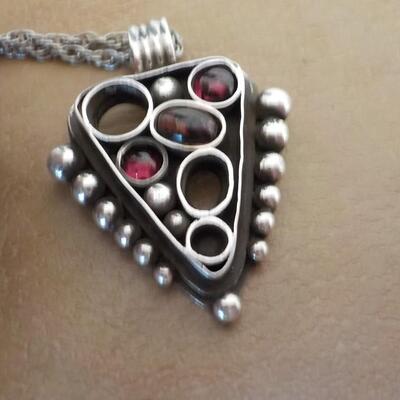 Totally Art Deco sterling silver necklace with precious stones.