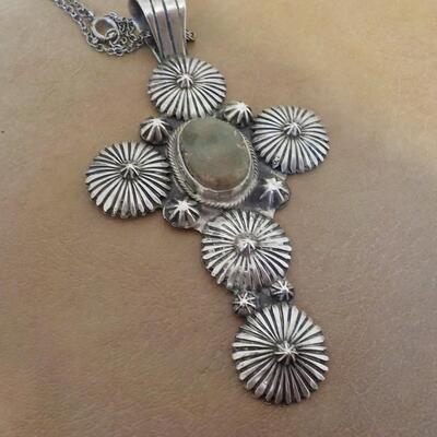 Sterling silver lg. cross by RB. designs.