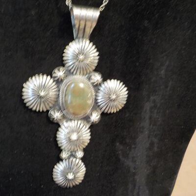 Sterling silver lg. cross by RB. designs.