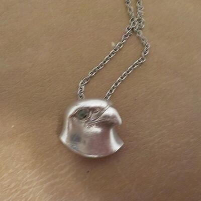 Stunning sterling silver Falcon with eye stone. Necklace.