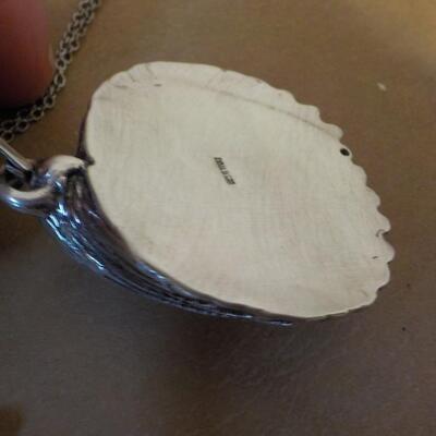 Sterling silver sea shell necklace.