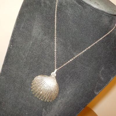 Sterling silver sea shell necklace.