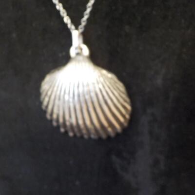 Sterling silver sea shell necklace.