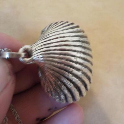 Sterling silver sea shell necklace.