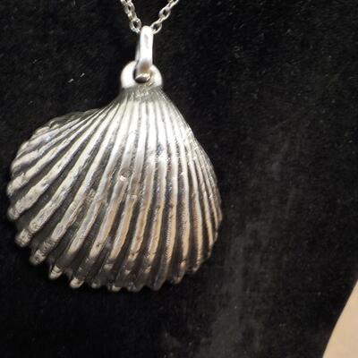 Sterling silver sea shell necklace.