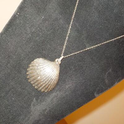 Sterling silver sea shell necklace.