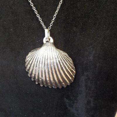 Sterling silver sea shell necklace.