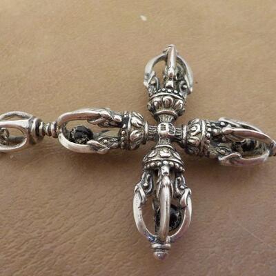 Sterling silver Maltese style necklace with precious stones.