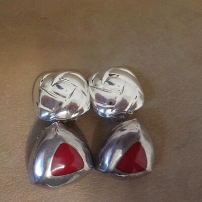 2 Pair of clip on sterling silver ear rings.