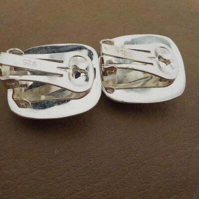 2 Pair of clip on sterling silver ear rings.