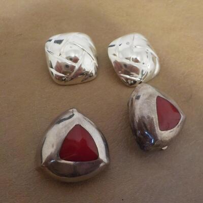 2 Pair of clip on sterling silver ear rings.