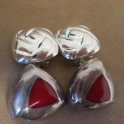 2 Pair of clip on sterling silver ear rings.