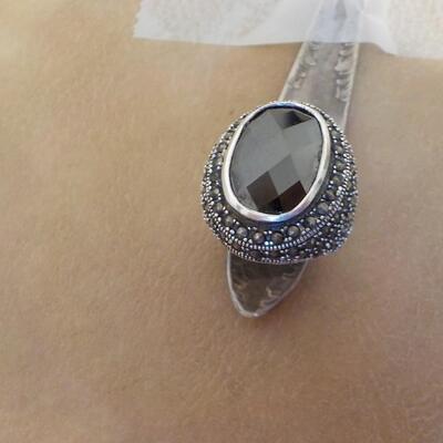 Hi - Fashion dinner sterling onyx ladies ring.