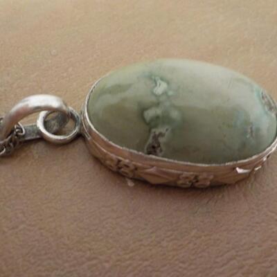 Sterling silver Jade stone necklace good size.