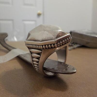 Sterling silver artistic design.