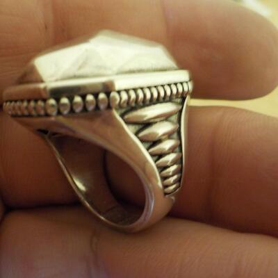 Sterling silver artistic design.