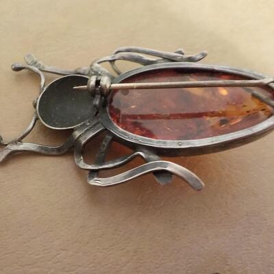 Sterling silver Beatle with colored moon stone.