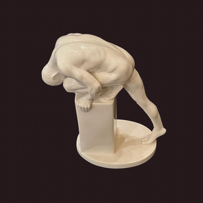 Porcelain Male Nude Stretching on a Pedestal - 9"