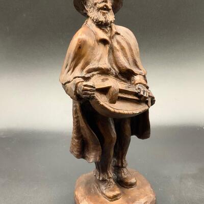 Beautiful vintage statue of a French musician