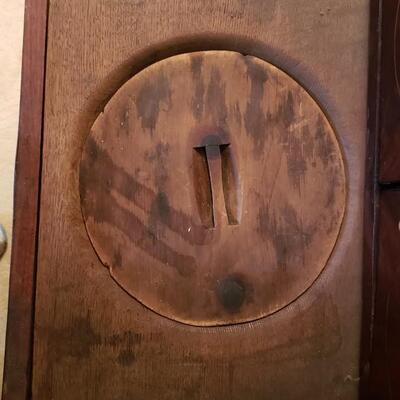 Antique chamber pot concealed as side table