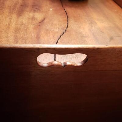 Antique chamber pot concealed as side table