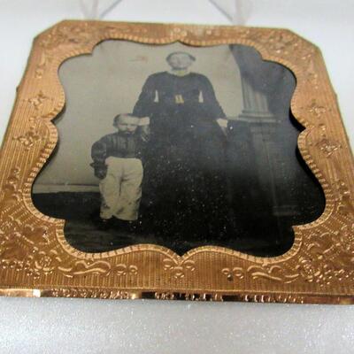 ANTIQUE TINTYPE Photo Lady and Young Boy in Fancy Brass Matt-like Edging, Small Size