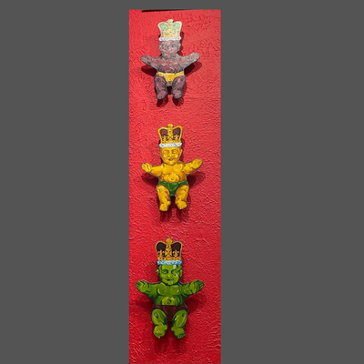Three Wooden King Cake Babies Signed by Artist Shaun Aleman